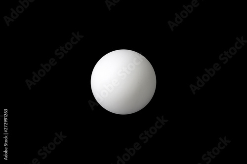 Tennis ball on a black background.