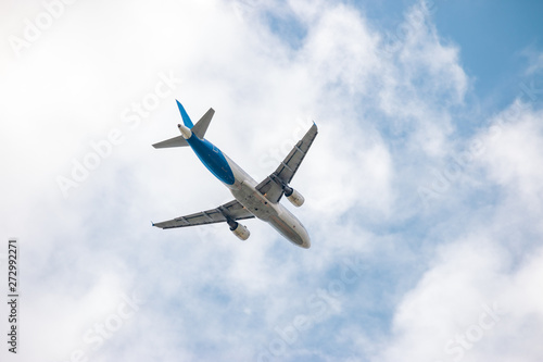Airplane takes off from international airport isolated on white background