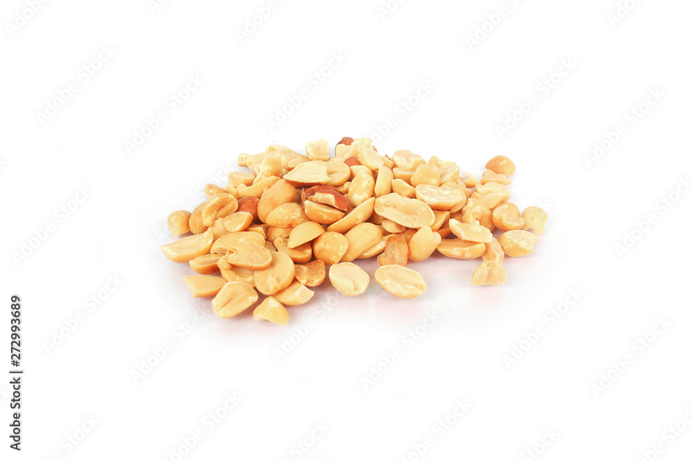 Ground roasted peanuts on white background. Ground roasted peanuts on white background.