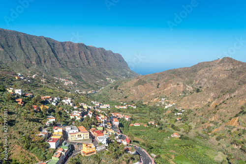 The valley of Hermigua with several villages, high mountains and agricultural exploiting in the north-east of the island of La Gomera photo