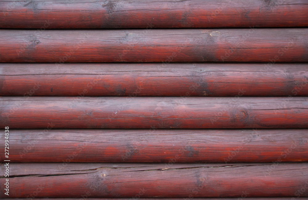 Wooden dark Burgundy logs wall texture background Wooden dark Burgundy logs wall texture background