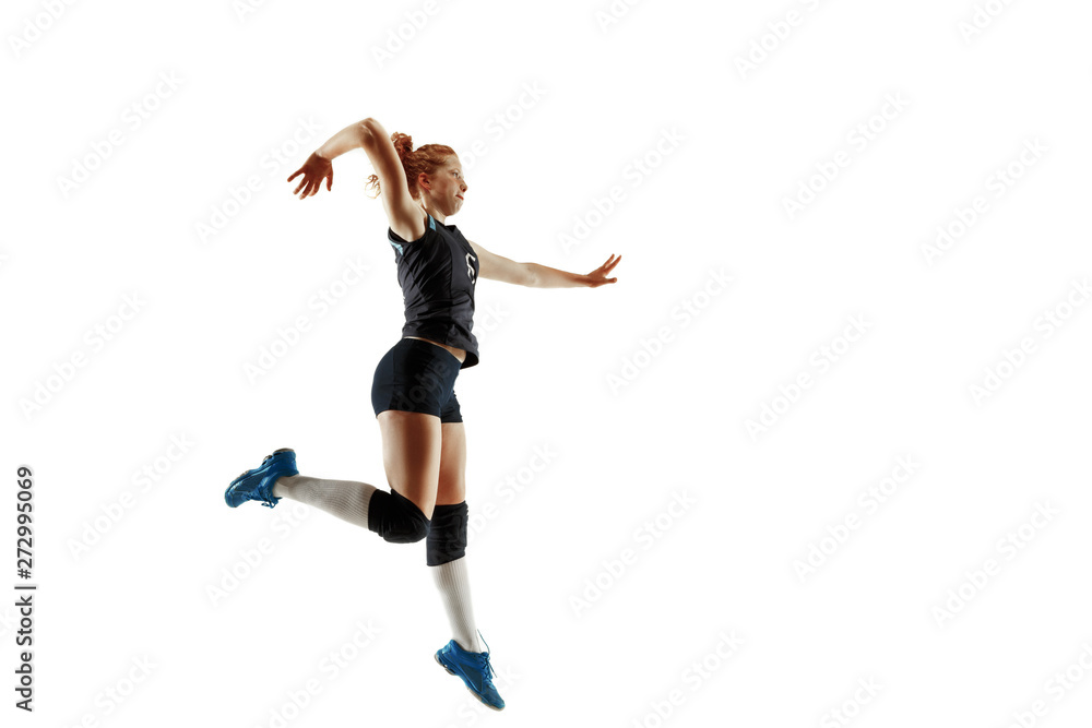 Young female volleyball player isolated on white studio background. Woman in sport's equipment and shoes or sneakers training and practicing. Concept of sport, healthy lifestyle, motion and movement. Young female volleyball player isolated on white studio background. Woman in sport's equipment and shoes or sneakers training and practicing. Concept of sport, healthy lifestyle, motion and movement.