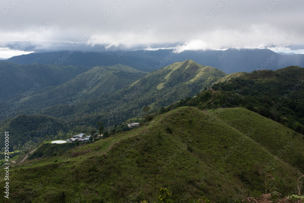 Naklejka premium Mountains, clouds, sky and paths