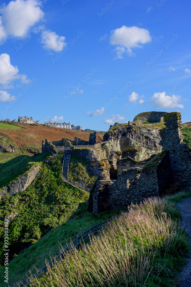 Obraz premium View of Tintagel Island and legendary Tintagel castle ruins