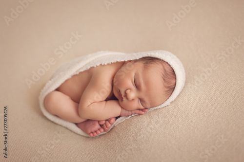 Cute sleep newborn baby boy 10 day old