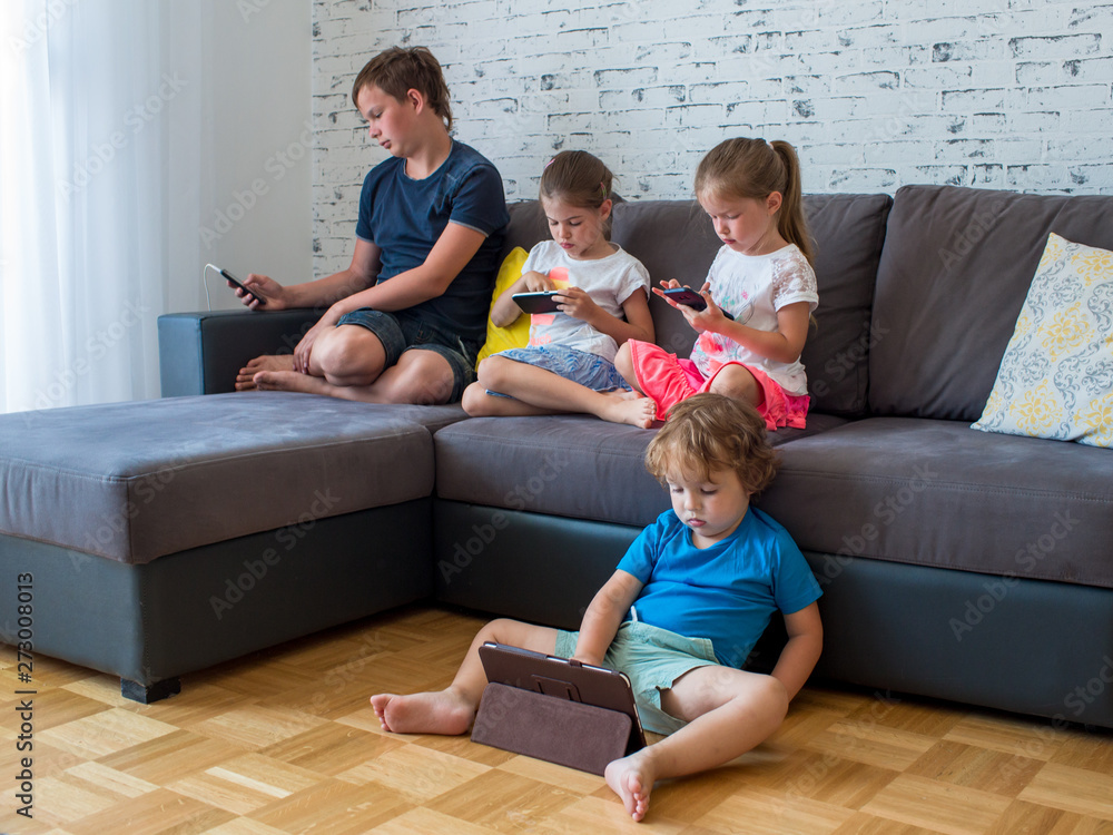 young children use electronic gadgets, the concept of children's addiction of phones and tablets