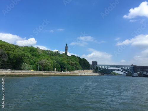 Magnificent bridges cross over the Harlem River with blue sky background, New York City.