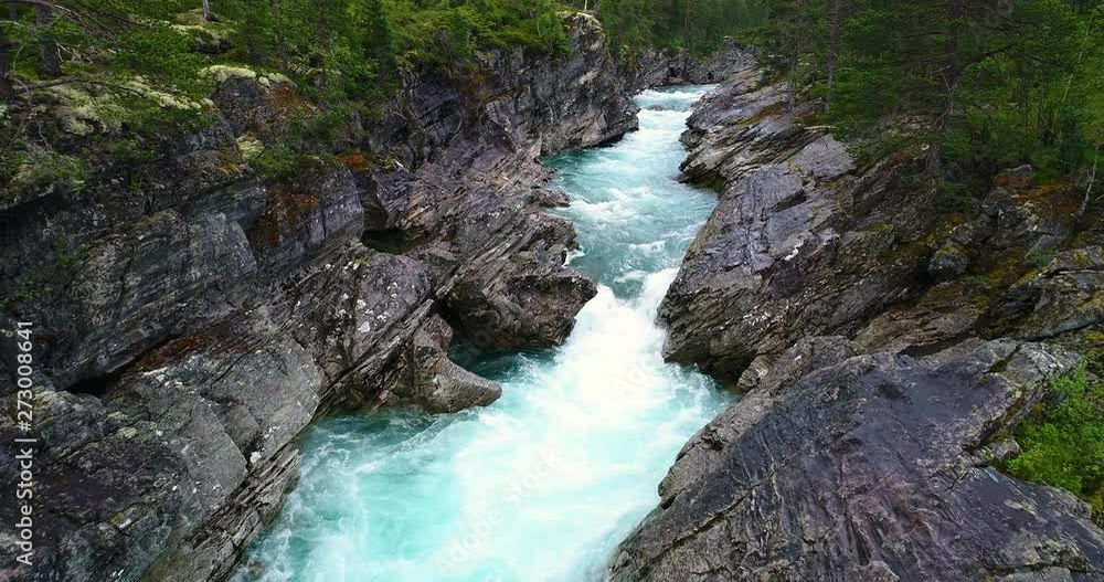 AERIAL: Flying over mountain river. Hordaland, Norway. AERIAL: Flying over mountain river. Hordaland, Norway.