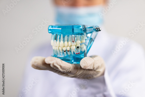 dentist with tool
