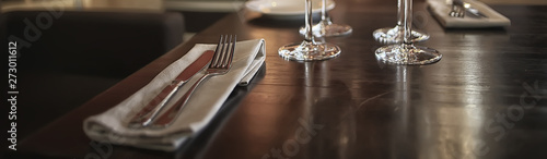 fork and knife serving in the interior of the restaurant   table in a cafe  food industry catering  menu