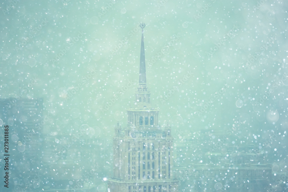 snow in a night city skyscrapers / seasonal landscape winter city, snowfall against a background of skyscrapers