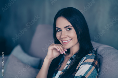 Close up side profile photo beautiful she her lady hand arm chin imaginary flight calm peaceful look kindhearted easy-going perfect teeth  wear checkered shirt sit cozy divan house living room indoors