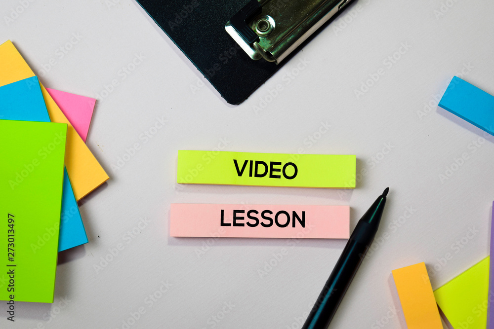 Video Lesson text on sticky notes with office desk concept Video Lesson text on sticky notes with office desk concept