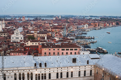 Fototapeta Naklejka Na Ścianę i Meble -  Beautiful super wide-angle aerial view of Venice, Italy with harbor, islands, skyline and scenery beyond the city, seen from the observation tower of St Mark's Campanile