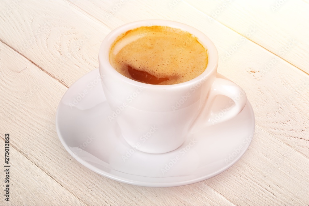 Coffee cup on wooden background Coffee cup on wooden background