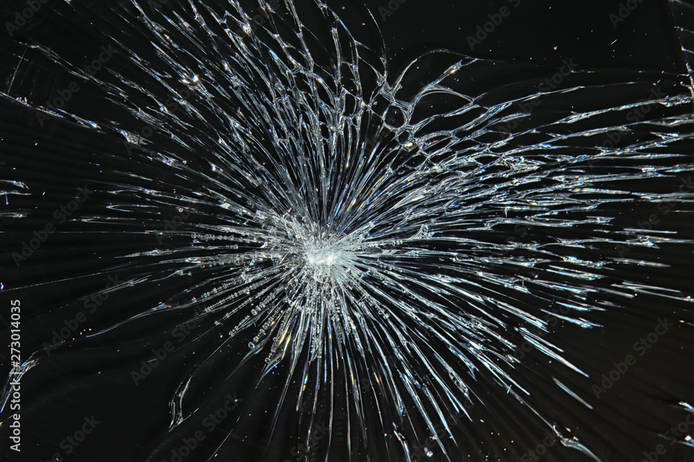 Obraz premium cracked black glass / broken glass abstract texture background