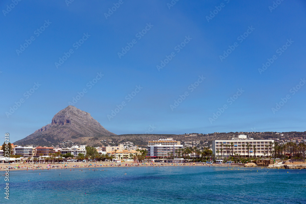 Xabia Spain Playa del Arenal beach in summer with blue sky and sea, also known as Javea