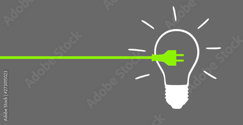 Grüner Stromstecker mit Lampe