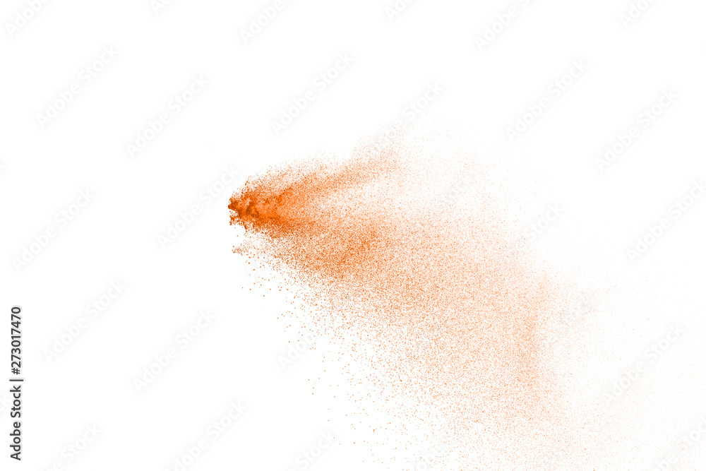 Fototapeta premium Explosion of brown powder on white background.