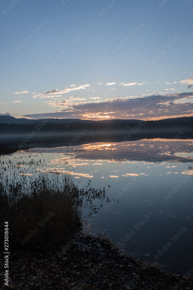 New Hampshire pond with sunrise