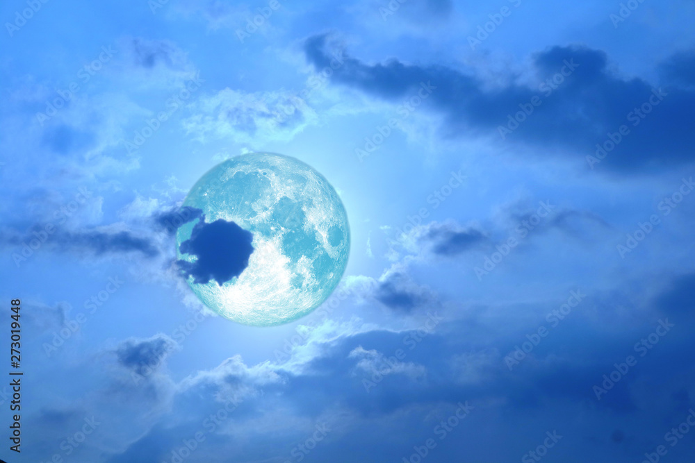 full strawberry moon back on silhouette heap cloud on night sky