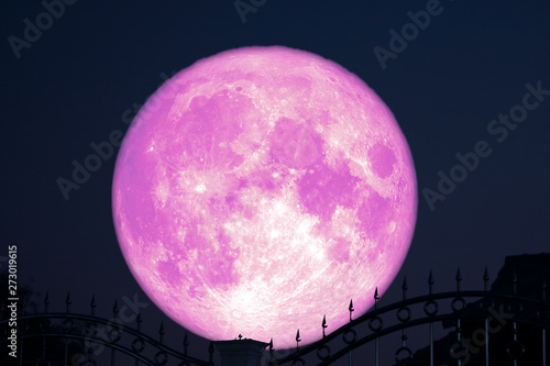 Fényképezés strawberry moon on night sky back silhouette stainless steel iron fence