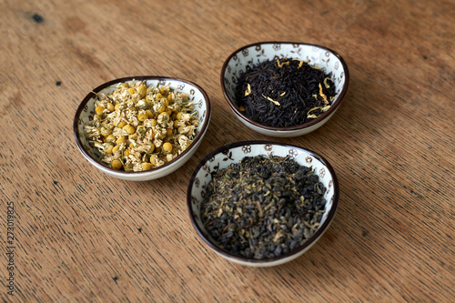 Earl Grey and Chamomile tea on a wooden table 