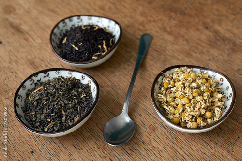 Earl Grey and Chamomile tea on a wooden table 