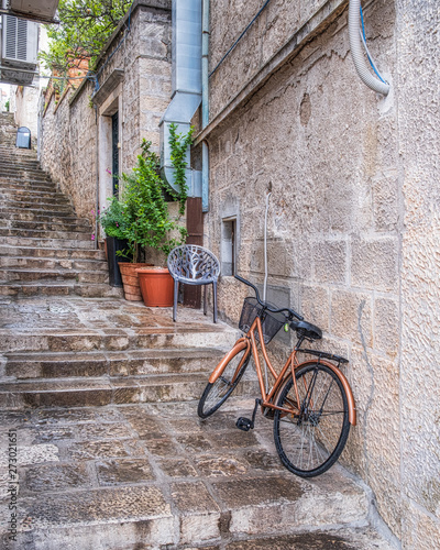 Bicycle in cobblestone alley