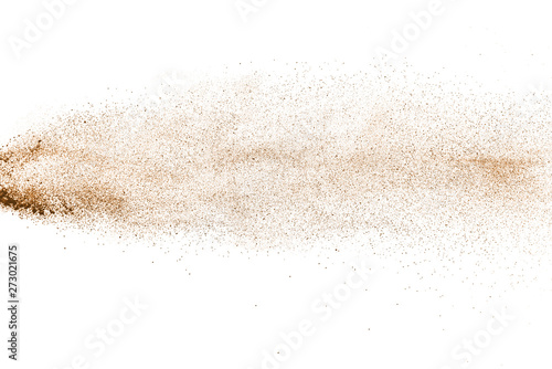 Explosion of brown powder on white background.