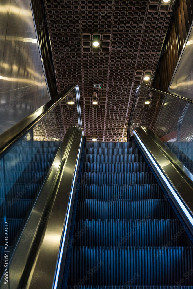 golden blue escalator in Monaco golden blue escalator in Monaco