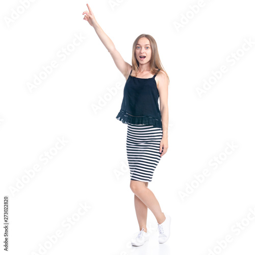 Woman in skirt showing pointing on white background isolation