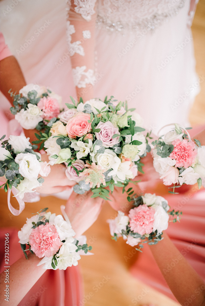 Bridesmaids bridesmaids from flowers on their hands Bridesmaids bridesmaids from flowers on their hands