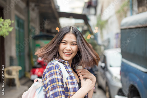 Fashion asian women travel in city on street