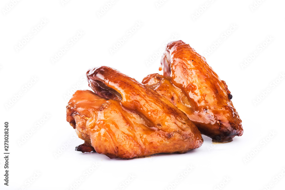 Honey-boiled chicken wings on a white background Honey-boiled chicken wings on a white background