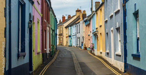Brightly coloured terraced houses in Appledore street England