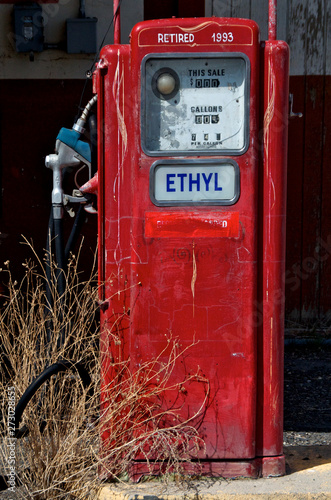 Old red gas station pump with higher grade ethyl gasoline from bygone era, Orvada, Nevada  photo