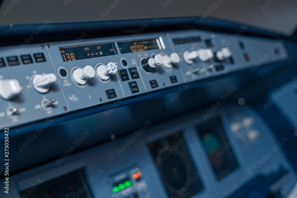 Toggle switches and sensors on the dashboard in the cabin of passenger plane Toggle switches and sensors on the dashboard in the cabin of passenger plane