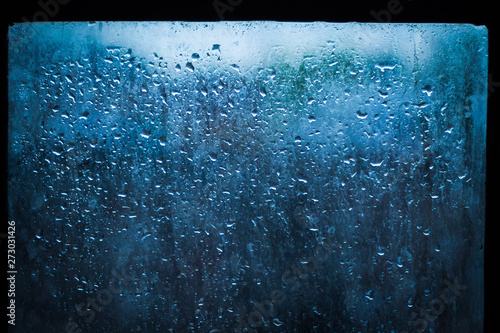 rain water drops on window glass, India in Monsoon