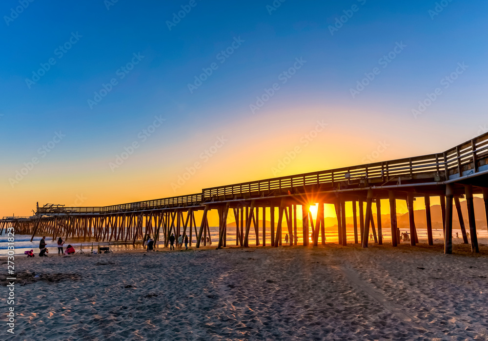 Sunset at beach with Pier