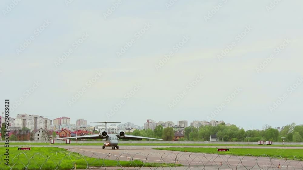 Passenger Airplane is driving along the runway. The movement of aircraft after landing. Passenger Airplane is driving along the runway. The movement of aircraft after landing.