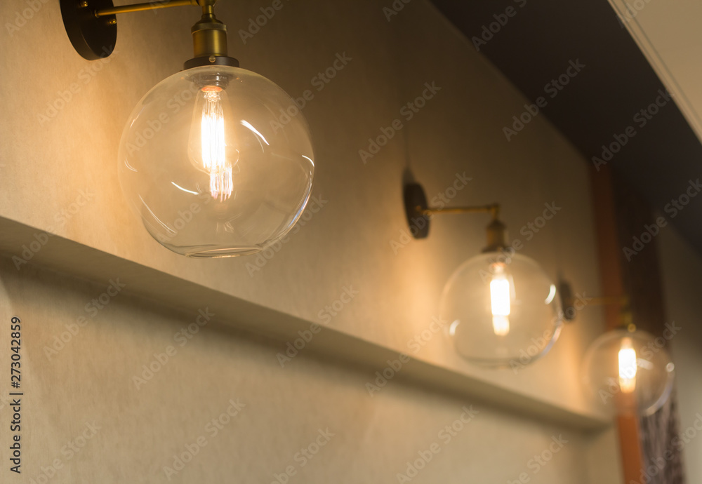Round glass retro lamps in a row Round glass retro lamps in a row