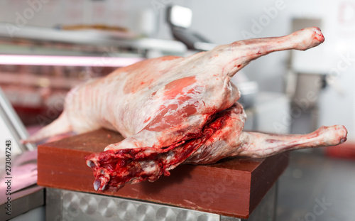 Lamb carcase in butcher shop