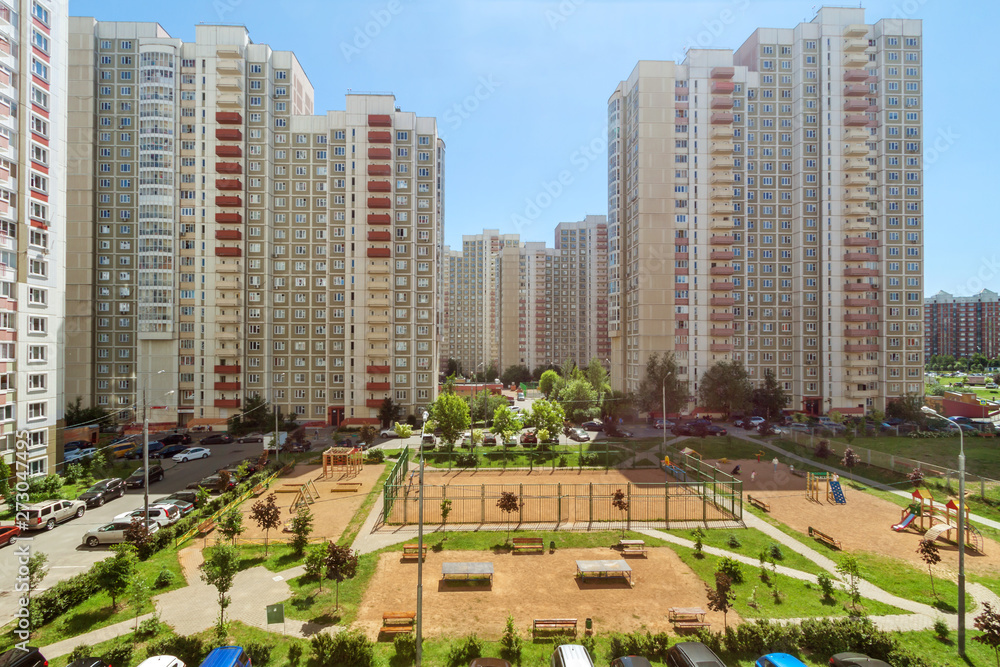 Obraz premium Aerial view playground workout place and house building exterior mixed-use urban multi-family community residential district area development