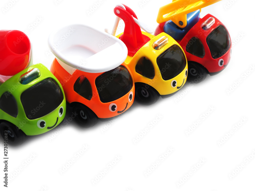 Exposed children's construction machines. Isolated on white background. Space for text.. Exposed children's construction machines. Isolated on white background. Space for text..