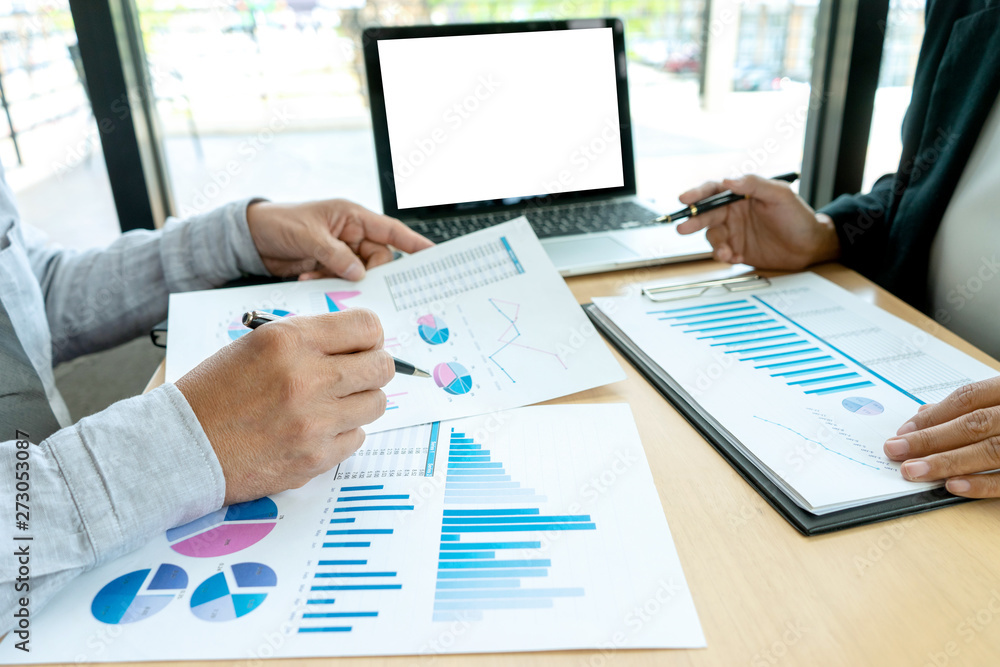 In business office businessman in meeting analyses chart In business office businessman in meeting analyses chart