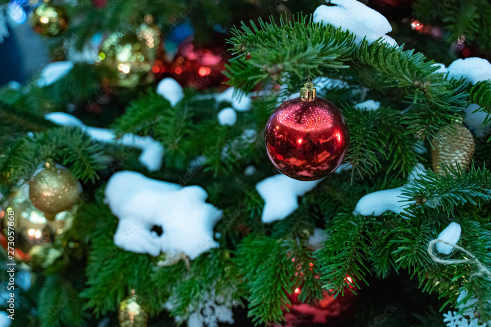 Decorated Christmas tree close up details. Christmas tree lights and toys Decorated Christmas tree close up details. Christmas tree lights and toys