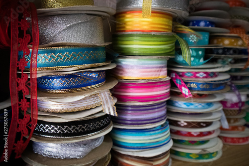 Stacks of Spools of Colorful Ribbon