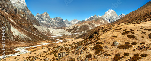 Photography Scenic valley and Himalayan mountains peaks on trek between Tengboche and Lobuche, Nepal