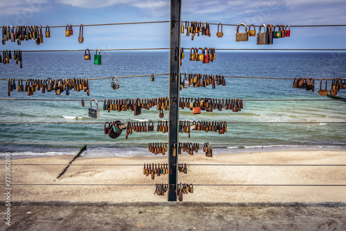 Seaview platform with love padlocks in Rewal, small village on the Baltic Sea coast in Poland photo